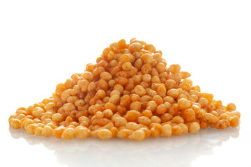 Close-up of crunchy masala boondi Indian namkeen (snacks), Indian spicy snacks (Namkeen), in a pile or heap, isolated over white background