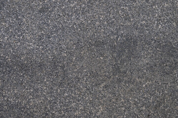 Abstract background of grey tiled walkway in a park