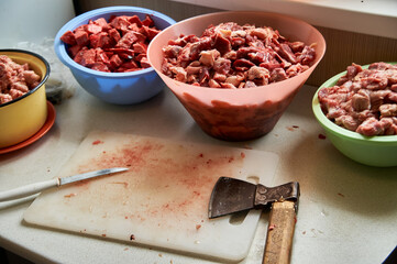 preparation of food for raw feeding. BARF food for dogs and cats. Packaging of food for animals.