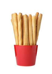 Delicious grissini sticks in cup on white background
