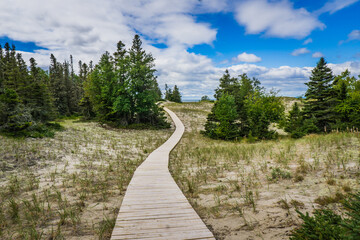 Boardwalk and hiking trail of the Pointe Aux Outardes Nature Park in the Quebec region of Cote Nord, Canada