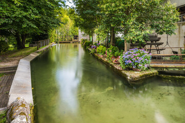 Fototapeta premium Water games in the village of the ancient mills.