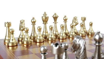 Set of golden chess pieces on wooden board against white background