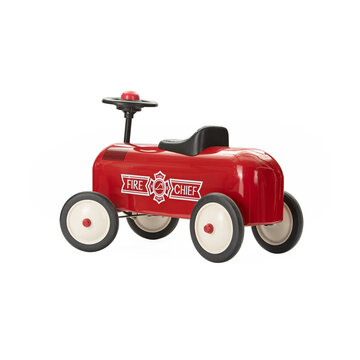 red shiny fire truck toy on white background