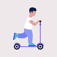 Little boy riding a scooter