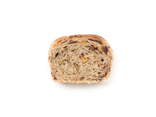 slice of whole wheat cereal and raisin bread loaf on white background