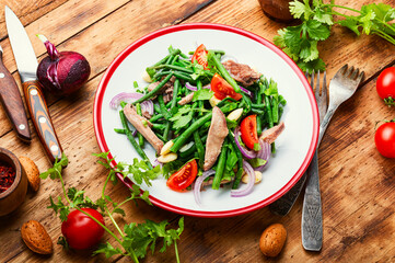 Salad with vegetables and veal tongue