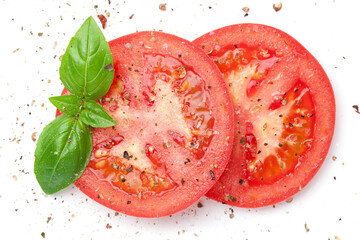 Sliced Red Tomatoes Sprinkled With Ground Pepper