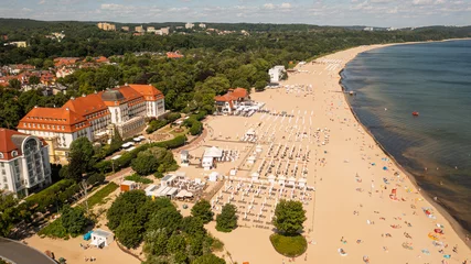 Store enrouleur occultant La Baltique, Sopot, Pologne Sopot,Poland,Europe.Aerial photo from drone to the beach Sopot, wooden pier (molo) resort old lighthouse,  with marina, yachts, infrastructure, park, promenade and Sofitel Grand Sopot Hotel