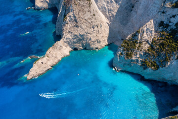 View of Navagio beach, Zakynthos Island, Greece. Aerial landscape. Azure sea water. Rocks and sea. Summer landscape from the air.