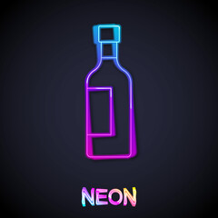 Glowing neon line Bottle of wine icon isolated on black background. Vector