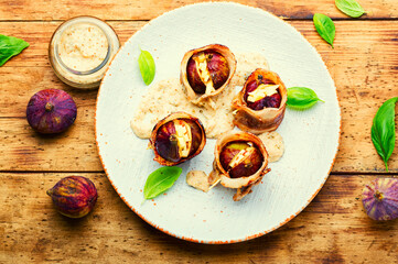 Figs baked in bacon with cheese,top view