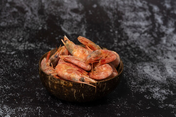 quick-frozen prawns in an eco cup made from coconut shells