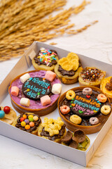 Martabak Mini or Martabak Mini Bangka with various Topping. The martabak mini bangka is made from a mixture of flour, eggs, sugar, baking soda, coconut milk and water.