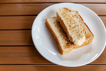 Breakfast plate, toast and jam with butter