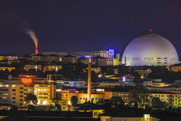 Stockholm, Sweden The Ericsson Globe Arena and cityscape at night.