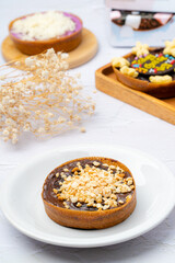 Martabak Mini or Martabak Mini Bangka with various Topping. The martabak mini bangka is made from a mixture of flour, eggs, sugar, baking soda, coconut milk and water.