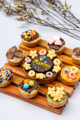 Martabak Mini or Martabak Mini Bangka with various Topping. The martabak mini bangka is made from a mixture of flour, eggs, sugar, baking soda, coconut milk and water.