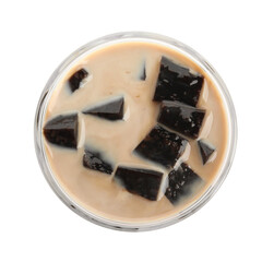 Glass of milk with grass jelly isolated on white, top view