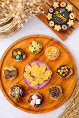 Martabak Mini or Martabak Mini Bangka with various Topping. The martabak mini bangka is made from a mixture of flour, eggs, sugar, baking soda, coconut milk and water.