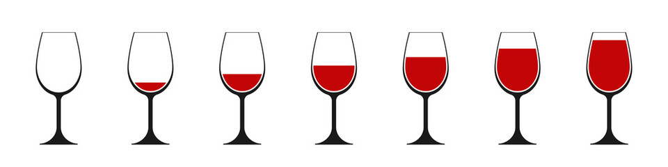 A set of wine glasses with wine.