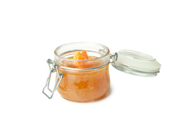Glass jar of mandarin jam isolated on white background