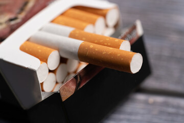 A pack of cigarettes on the table.