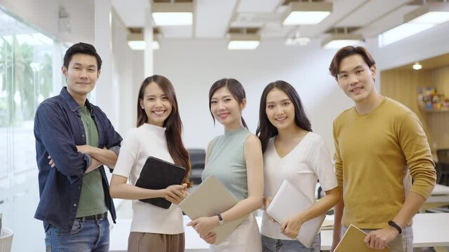 Portrait of creative business team. Hipster Creative Startup Young business people in modern office.