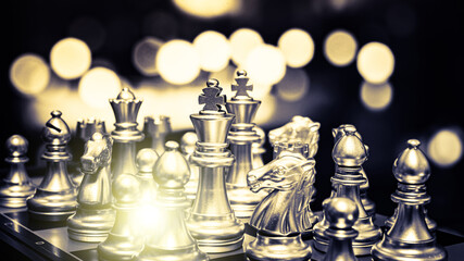 Closeup of chess characters on board games. to represent decision making in term of business strategy to find out the best solution to meet target objective and goal.