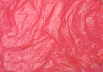 crumpled red polyethylene texture, close up, full frame