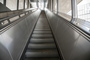 empty escalator in a subway station in Vienna diminishing perspective