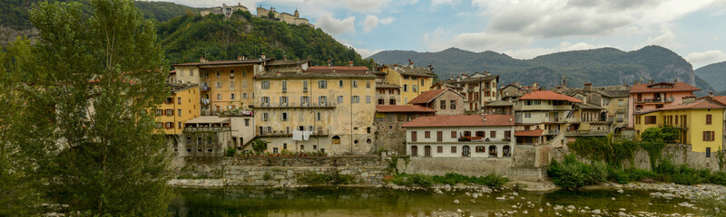 Fototapeta na wymiar Varallo Sesia village and Sacred mountain sanctuary on background in Piedmont, Italy