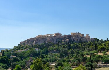 Fototapeta na wymiar Panoramic view of the Acropolis of Athens, from below and on a sunny day
