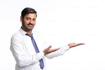 Young indian man showing expression on white background