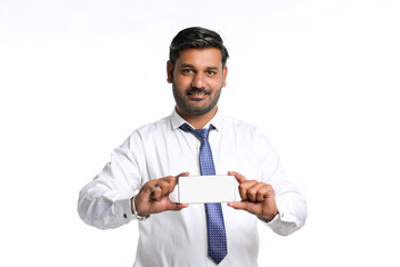 Young indian officer showing smartphone screen on white background.