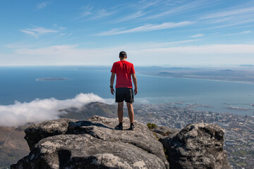 Man looking down to Cape Town, South Africa .