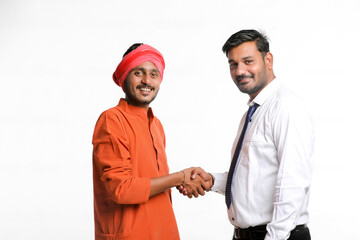 Young indian officer with farmer on white background.