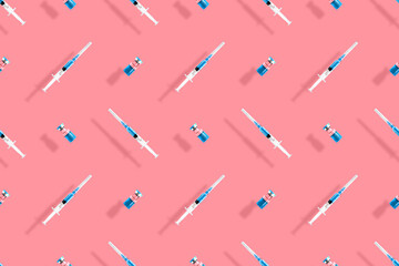 Medical syringes seamless pattern. Background on the theme of medicine, vaccination and human health.