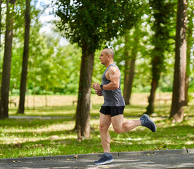 Long distance runner training in the park