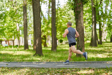 Long distance runner training in the park