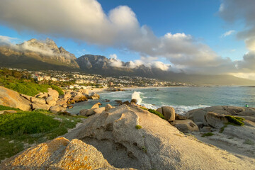 Fototapeta na wymiar Scenic view of Camps Bay, South Africa with twelve apostles in the background.