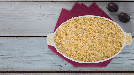 Recipe for organic plum cake, products on the rustic table.