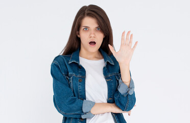 Stop right now. Offended and shocked woman showing block gesture, telling no, frowning and looking...