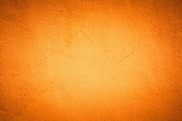 Old orange wall in spots, cracks, stains. Painted concrete wall in abstract grunge style loft. Vintage wall background texture for backgrounds, portraits, posters.