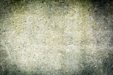 Old white wall in spots, cracks, stains. Painted concrete wall in abstract grunge style loft. Vintage wall background texture for backgrounds, portraits, posters.