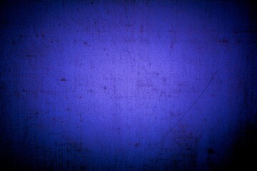 Old blue wall in spots, cracks, stains. Painted concrete wall in abstract grunge style loft. Vintage wall background texture for backgrounds, portraits, posters.