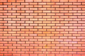 Weathered stained old orange brick wall background