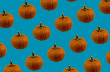 Background for the design and banner. Pumpkin on a blue background. Pattern