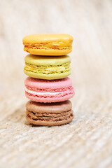 Colorful macaroons on light background