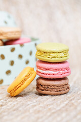 Colorful macaroons on light background